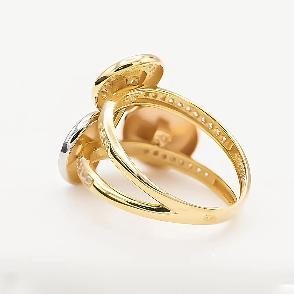 Anillo de oro de 18k acabado en mate, brillo con circonitas y oro blanco