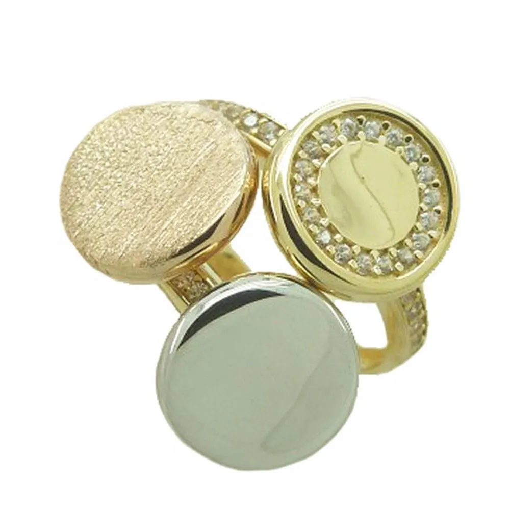Anillo de oro de 18k acabado en mate, brillo con circonitas y oro blanco
