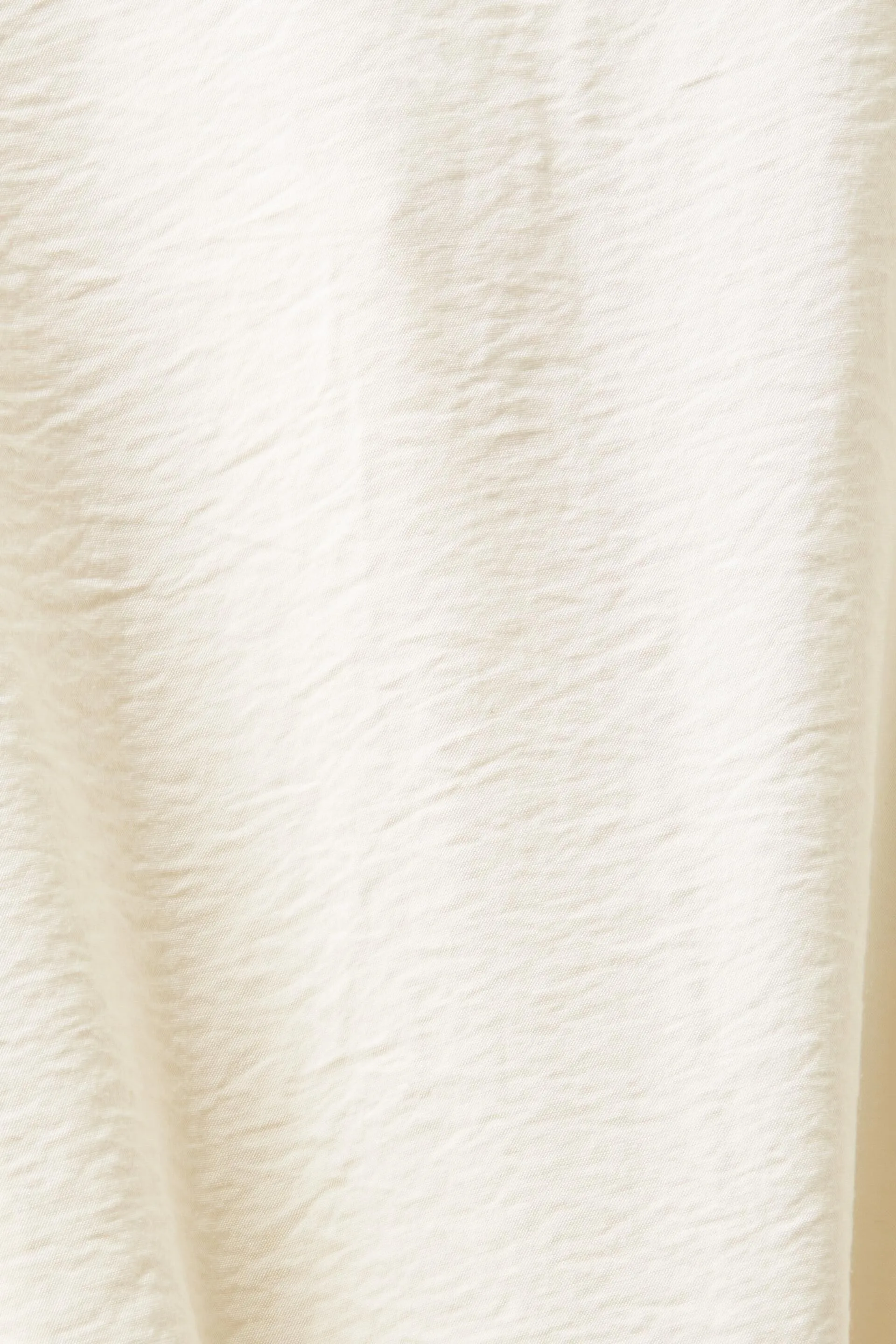 Blusa con efecto arrugado