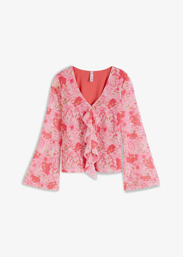 Blusa rosa pálido con flores