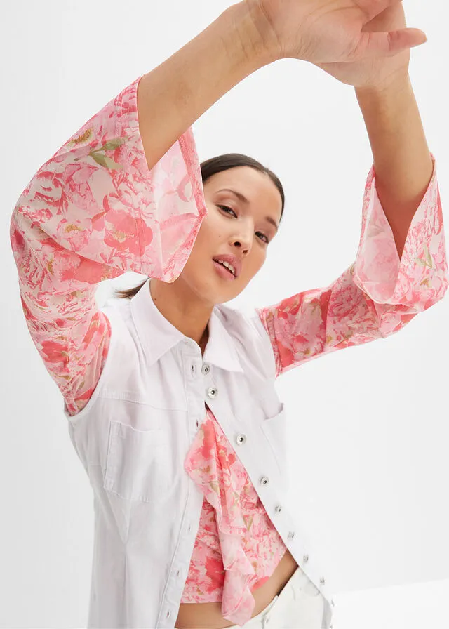 Blusa rosa pálido con flores