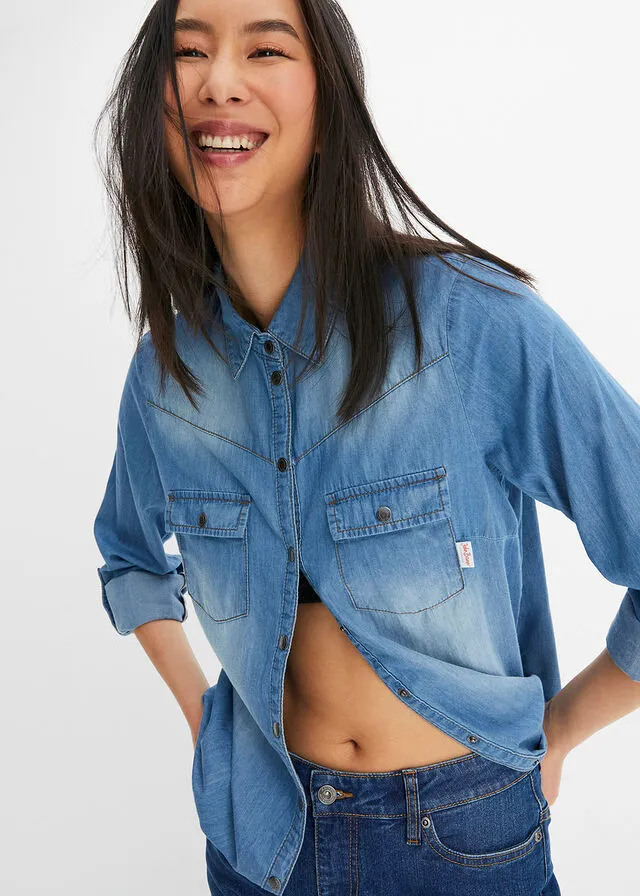 Blusa vaquera con cierres a presión azul provenzal