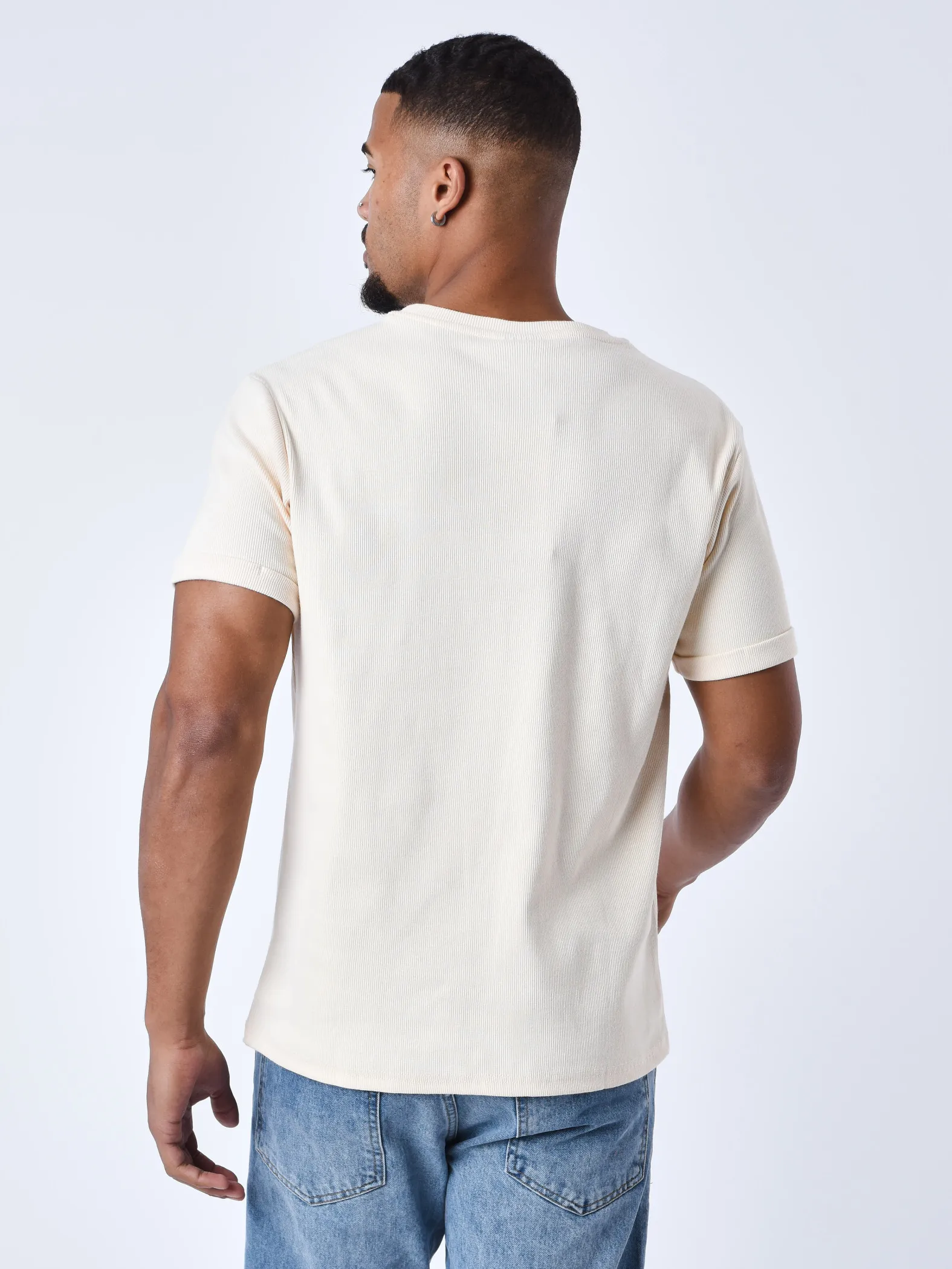 Camiseta con logotipo de la firma estilo bordado en disco de punto