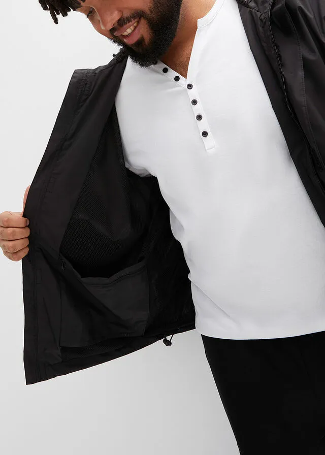 Impermeable Negro