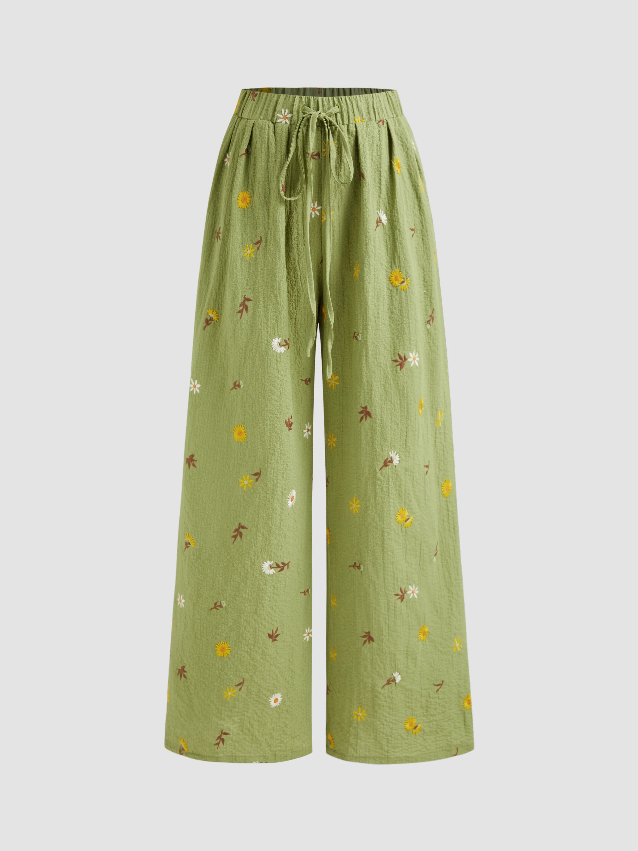 Pantalón con bordado floral y bolsillo con nudo de tiro medio