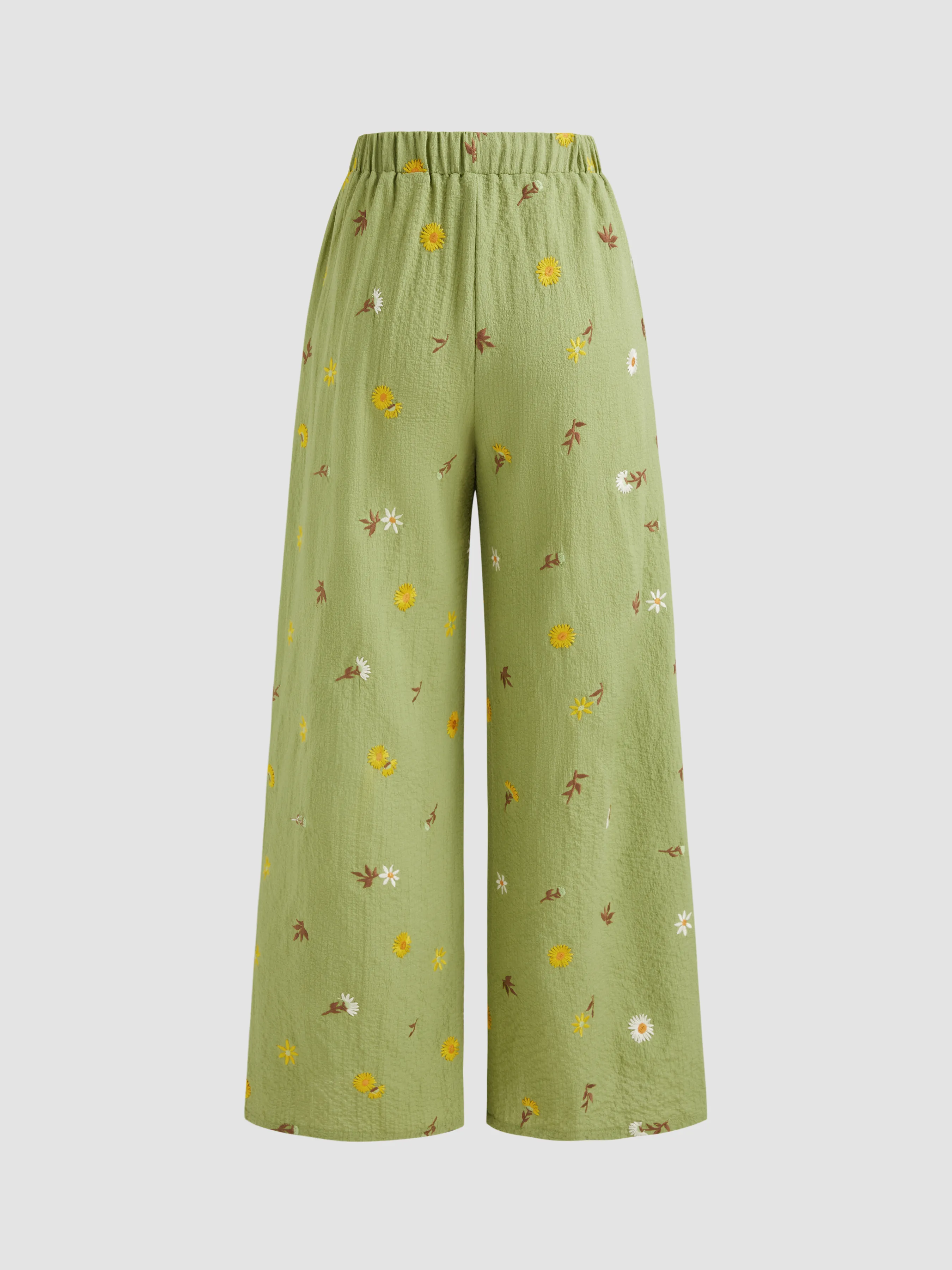 Pantalón con bordado floral y bolsillo con nudo de tiro medio