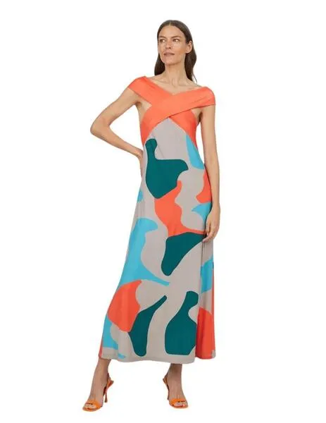 Vestido sin mangas cruzado de Mercedes de Miguel: elegancia contemporánea.